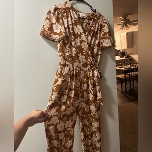 Size medium pantsuit. Never worn. Size medium. Smoke and pet free home.